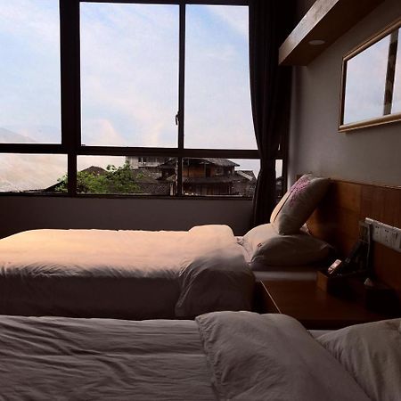 Travelling With Hotel Long Ji Ping An لونغشينغ المظهر الخارجي الصورة